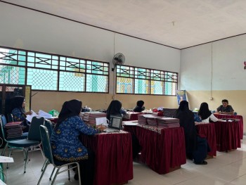 RAPAT PENENTUAN KENAIKAN KELAS DAN PEMBAGIAN TUGAS GURU