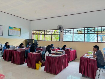 RAPAT PENENTUAN KENAIKAN KELAS DAN PEMBAGIAN TUGAS GURU