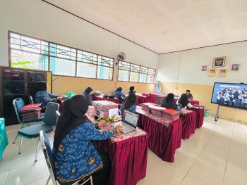 RAPAT PENENTUAN KENAIKAN KELAS DAN PEMBAGIAN TUGAS GURU